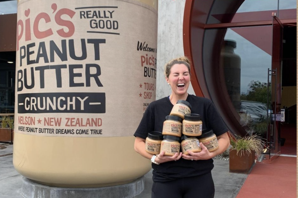 Han Romano holding pics peanut butter