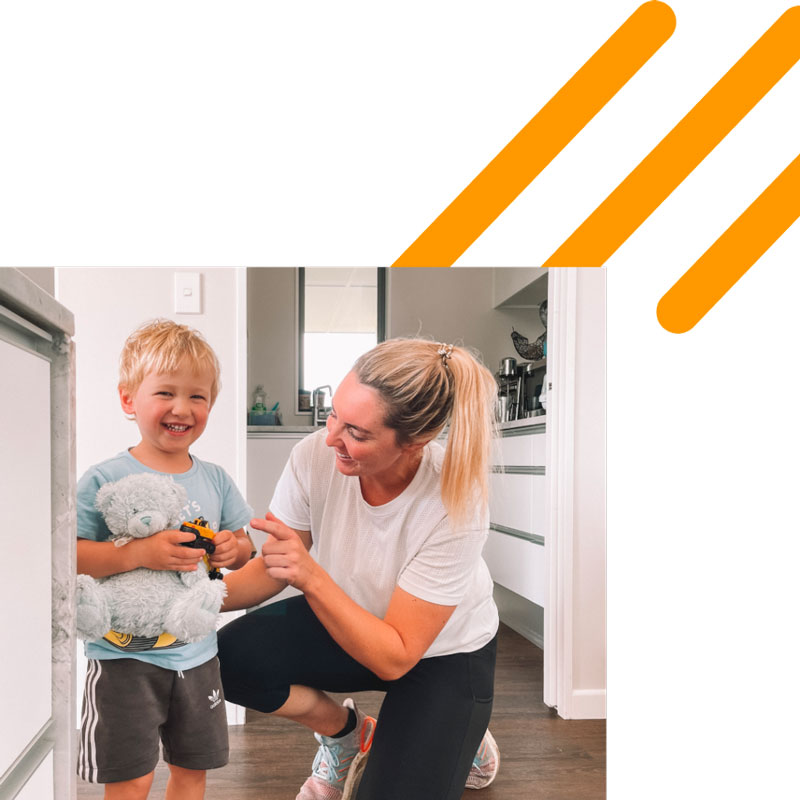 Han Romano with her son in the kitchen